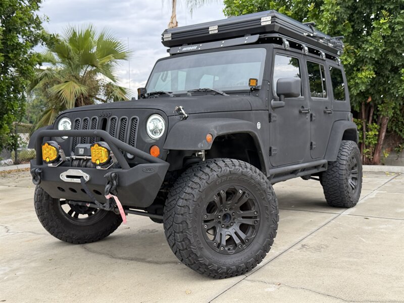 Used 2007 Jeep Wrangler Unlimited Sahara w/ Dual Top Group AWD/4WD image 1