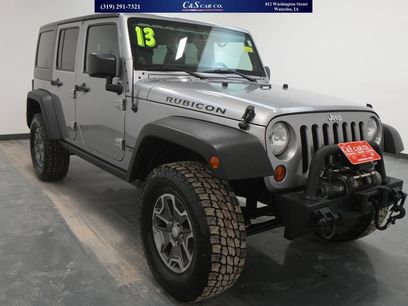Used 2013 Jeep Wrangler Unlimited Rubicon w/ Dual Top Group