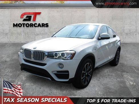Used 2018 BMW X4 xDrive28i AWD/4WD image 1