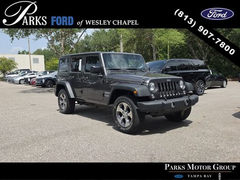 Used 2016 Jeep Wrangler Unlimited Sport w/ Max Tow Package AWD/4WD image 1