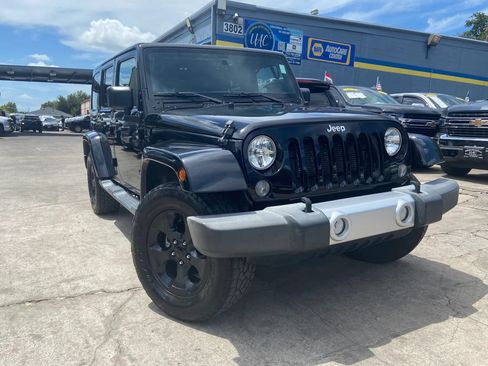 Used 2015 Jeep Wrangler Unlimited Sahara w/ Connectivity Group AWD/4WD image 1