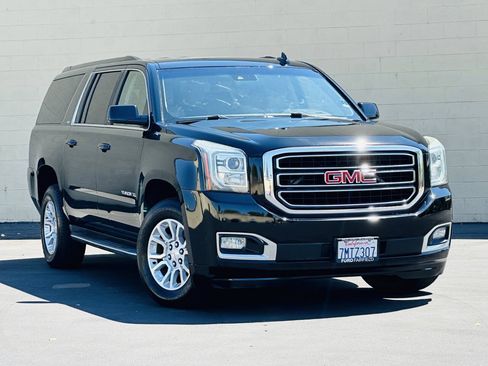 Used 2015 GMC Yukon XL SLT w/ Open Road Package AWD/4WD image 1