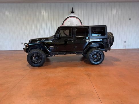 Used 2014 Jeep Wrangler Unlimited Sahara image 1