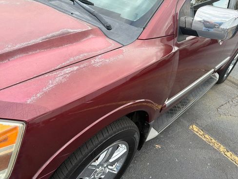 Used 2011 Nissan Armada Platinum w/ 2nd Row Captain Seat Pkg image 12