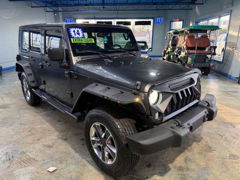 Used 2014 Jeep Wrangler Unlimited Sahara w/ Dual Top Group image 11