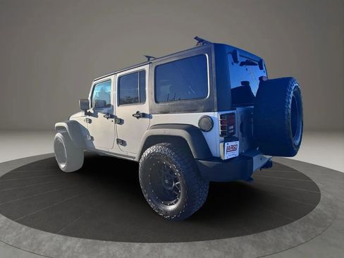 Used 2012 Jeep Wrangler Unlimited Sahara w/ Dual Top Group AWD/4WD image 5