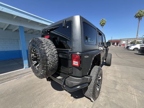 Used 2013 Jeep Wrangler Unlimited Sahara AWD/4WD image 3