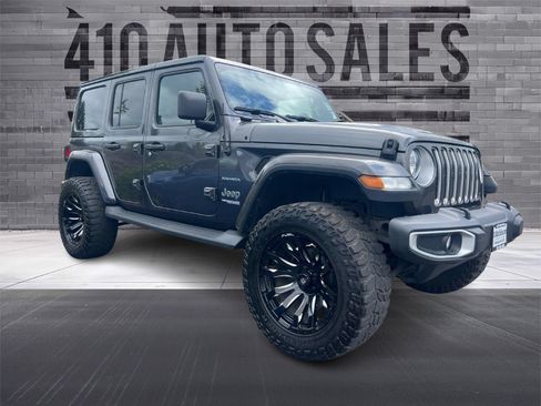 Used 2018 Jeep Wrangler Unlimited Sahara w/ Uconnect 4C Nav & Sound Group AWD/4WD image 1