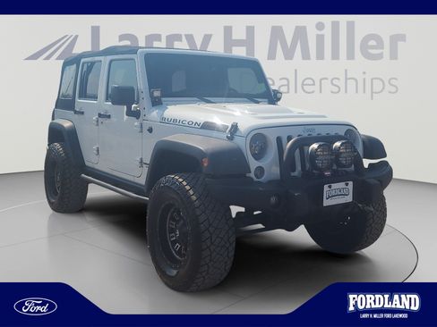 Used 2015 Jeep Wrangler Unlimited Rubicon w/ Dual Top Group AWD/4WD image 7