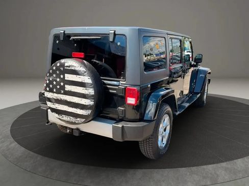Used 2014 Jeep Wrangler Unlimited Sahara w/ Dual Top Group AWD/4WD image 4