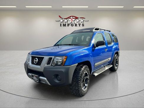 Used 2015 Nissan Xterra S image 1