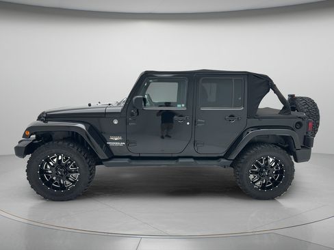 Used 2013 Jeep Wrangler Unlimited Sahara AWD/4WD image 7