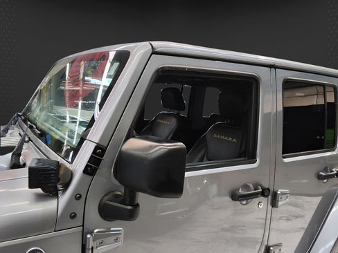Used 2014 Jeep Wrangler Unlimited Sahara w/ Dual Top Group AWD/4WD image 24