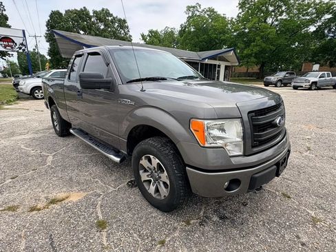 Used 2013 Ford F150 STX w/ Mid Equipment Group AWD/4WD image 1
