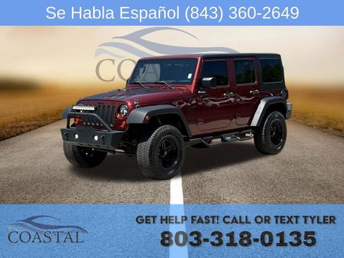 Used 2009 Jeep Wrangler Unlimited Sahara w/ Trailer Tow Group AWD/4WD image 1
