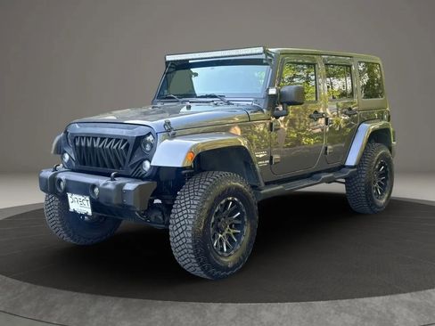 Used 2014 Jeep Wrangler Unlimited Sahara w/ Dual Top Group AWD/4WD image 1