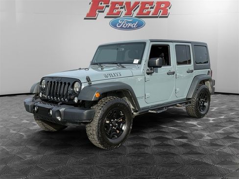Used 2014 Jeep Wrangler Unlimited Willys image 1