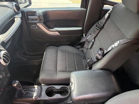 Used 2012 Jeep Wrangler Unlimited Sahara w/ Mopar Chrome Edition Group AWD/4WD image 16