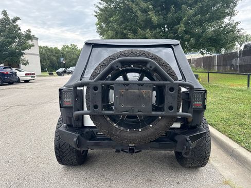 Used 2012 Jeep Wrangler Unlimited Sahara w/ Dual Top Group AWD/4WD image 6