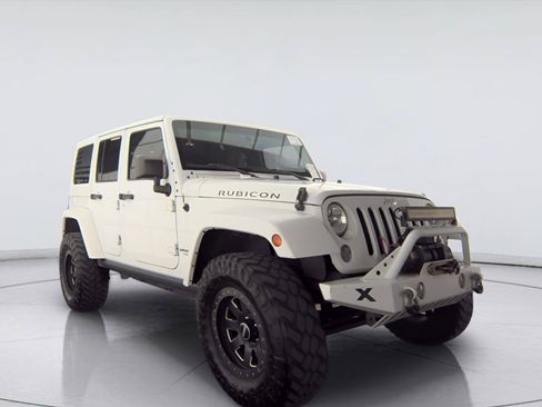 Used 2015 Jeep Wrangler Unlimited Rubicon w/ Connectivity Group AWD/4WD image 1