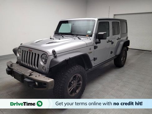 Used 2016 Jeep Wrangler Unlimited Sahara AWD/4WD image 1