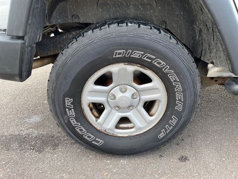 Used 2012 Jeep Wrangler Unlimited Sport w/ Black Appearance Group image 22