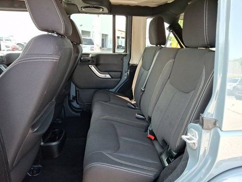 Used 2014 Jeep Wrangler Unlimited Sahara w/ Dual Top Group AWD/4WD image 14