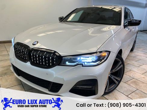 Used 2022 BMW 330i xDrive Sedan w/ M Sport Package image 1