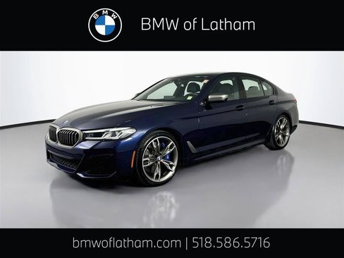 Used 2023 BMW M550i xDrive w/ Executive Package AWD/4WD image 1