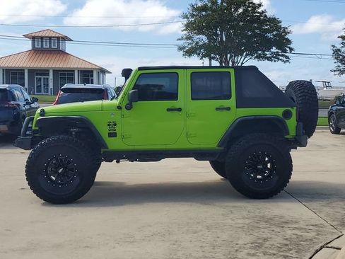 Used 2013 Jeep Wrangler Unlimited Sahara w/ Trailer Tow Group AWD/4WD image 2