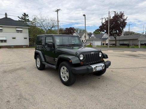 Used 2011 Jeep Wrangler Sahara AWD/4WD image 1