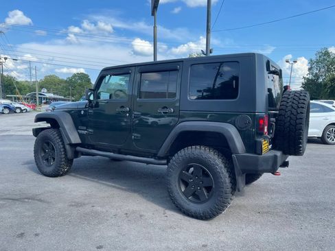 Used 2010 Jeep Wrangler Unlimited Sport w/ Dual Top Group AWD/4WD image 4
