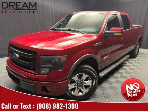 Used 2014 Ford F150 FX4 Pickup 4D 6 1/2 ft w/ Equipment Group 402A Luxury AWD/4WD image 1