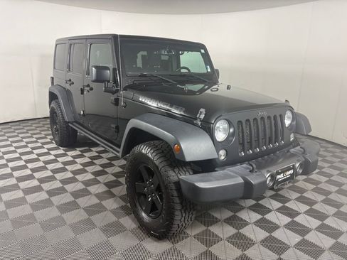 Used 2016 Jeep Wrangler Unlimited Sport image 1