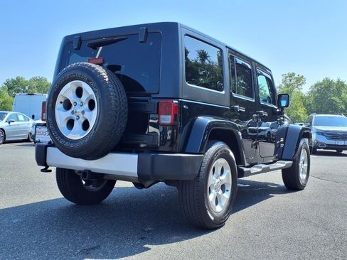 Used 2014 Jeep Wrangler Unlimited Sahara w/ Dual Top Group image 19