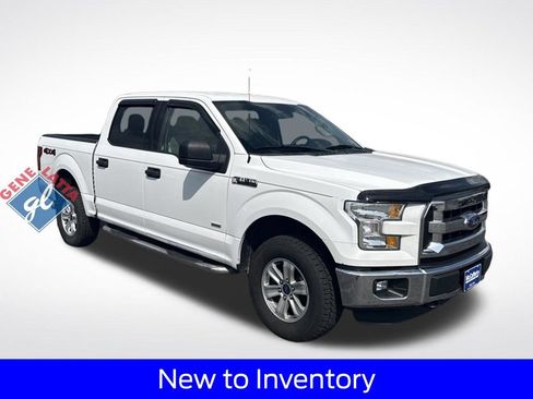 Used 2015 Ford F150 XLT AWD/4WD image 1