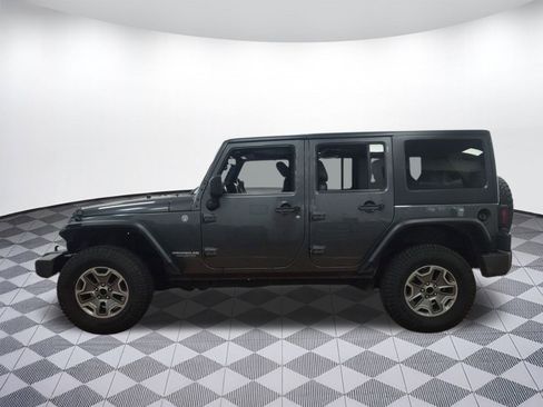 Used 2014 Jeep Wrangler Unlimited Rubicon w/ Dual Top Group image 2