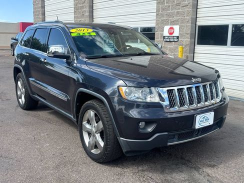 Used 2013 Jeep Grand Cherokee Overland w/ Advance Technology Group AWD/4WD image 1