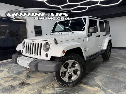 Used 2017 Jeep Wrangler Unlimited Sahara w/ Max Tow Package AWD/4WD image 1