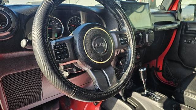 Used 2013 Jeep Wrangler Unlimited Sahara AWD/4WD image 14
