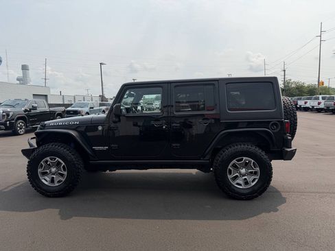 Used 2013 Jeep Wrangler Unlimited Rubicon w/ Dual Top Group AWD/4WD image 5
