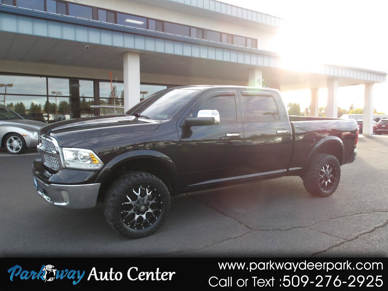 Used 2017 RAM 1500 Laramie AWD/4WD image 1