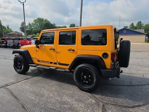 Used 2012 Jeep Wrangler Unlimited Sahara w/ Dual Top Group AWD/4WD image 4