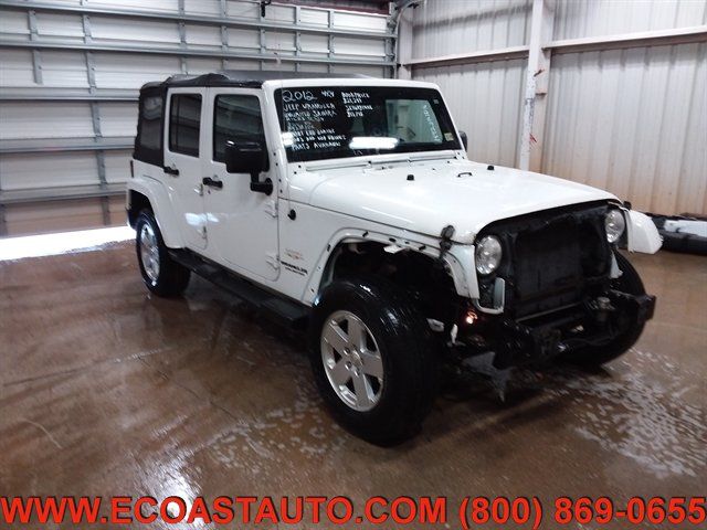 Used 2012 Jeep Wrangler Unlimited Sahara w/ Dual Top Group AWD/4WD image 1