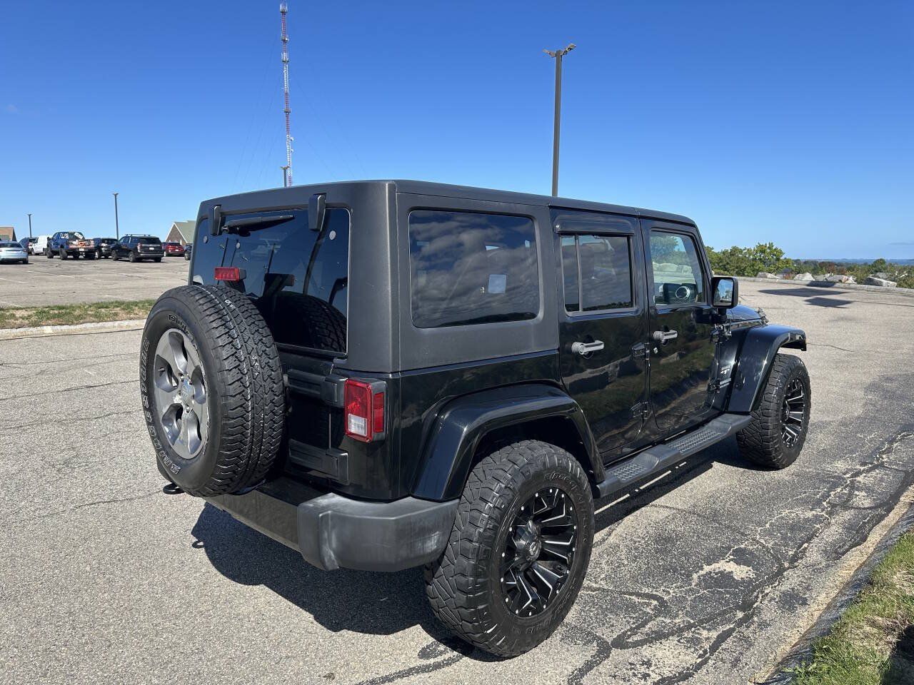 Used 2016 Jeep Wrangler Unlimited Sahara w/ Dual Top Group AWD/4WD image 11