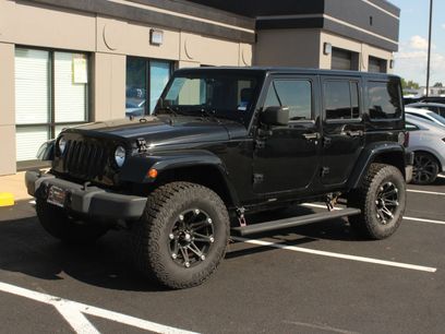 Used 2014 Jeep Wrangler Unlimited Sahara w/ Dual Top Group