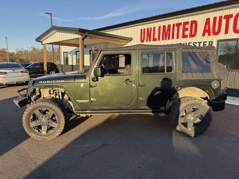 Used 2011 Jeep Wrangler Unlimited Rubicon w/ Dual Top Group AWD/4WD image 12