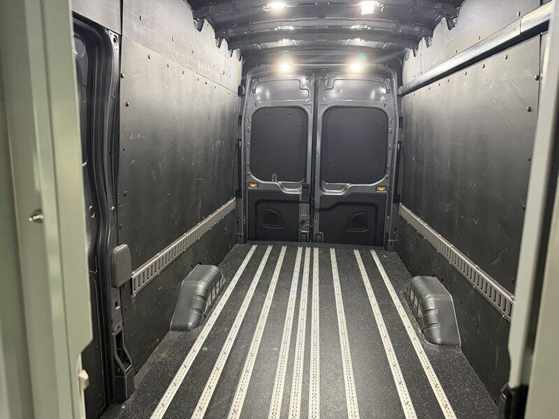Used 2022 Ford Transit 350 148 High Roof Extended AWD w/ Load Area Protection Package image 16