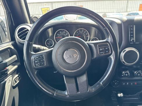 Used 2013 Jeep Wrangler Unlimited Sahara w/ Dual Top Group AWD/4WD image 14