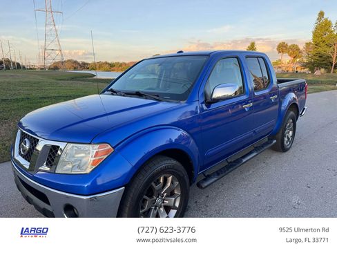 Used 2014 Nissan Frontier SL image 1